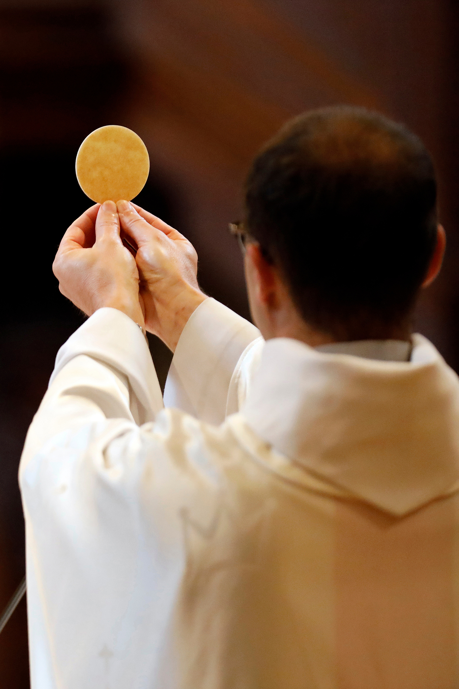 Catholic church. Celebration of Sunday Mass after the Covid-19 epidemic. Eucharist celebration.  Sallanches. France.